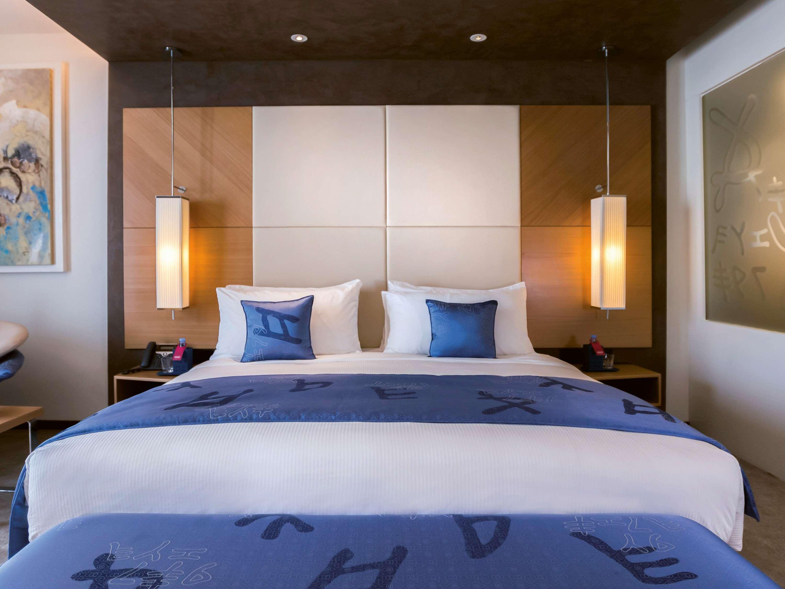 Moevenpick Hotel Du Lac Tunis Ngoại thất bức ảnh A bedroom at the hotel